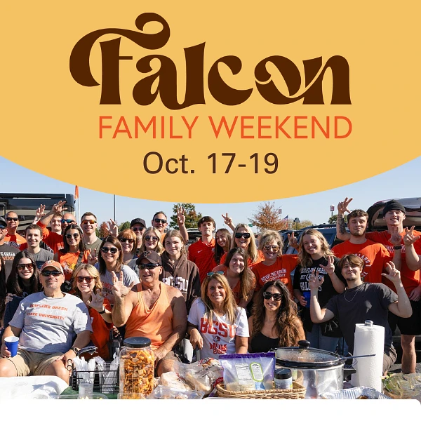 A group of people are gathered outdoors, smiling and celebrating under a banner for "Falcon Family Weekend" happening October 17-19.